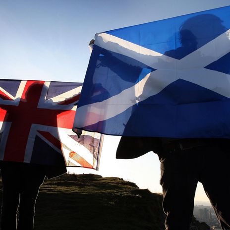 Men with British and Scottish flag