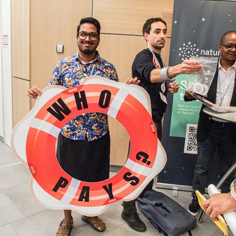 Demonstrant bei der Klimakonferenz in Bonn, 3. bis 13. Juni 2024