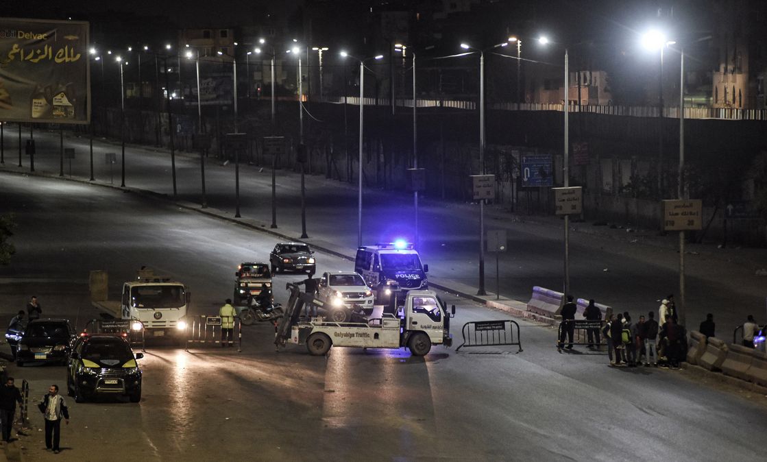 Police checkpoint near Cairo-Alexandria agricultural road during two-week Corona curfew