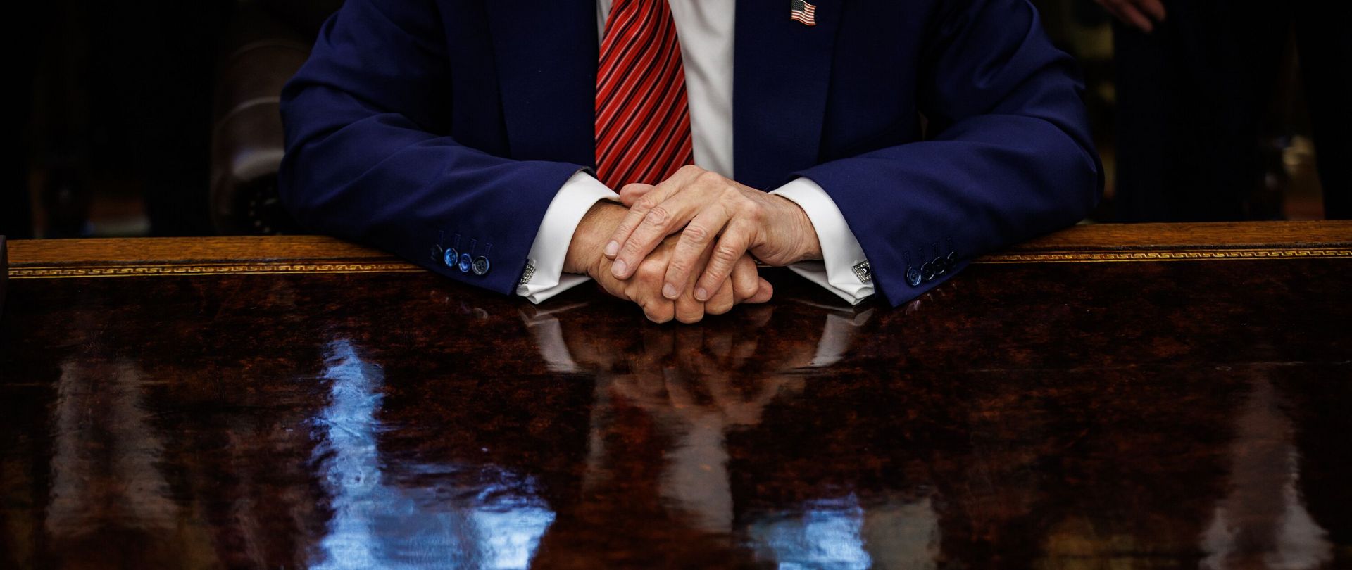 Reflection of Donald Trump on a table