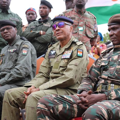 Members of the Niger military-run government (L-R) Police Deputy General Manager Assahaba Ebankawel, Colonel Sidi Mohamed and Colonel Ibroh Amadou Bacharou gather outside the French military base in Niamey, Niger, 01 October 2023.