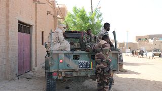 Malian forces patrol the streets of Timbuktu.